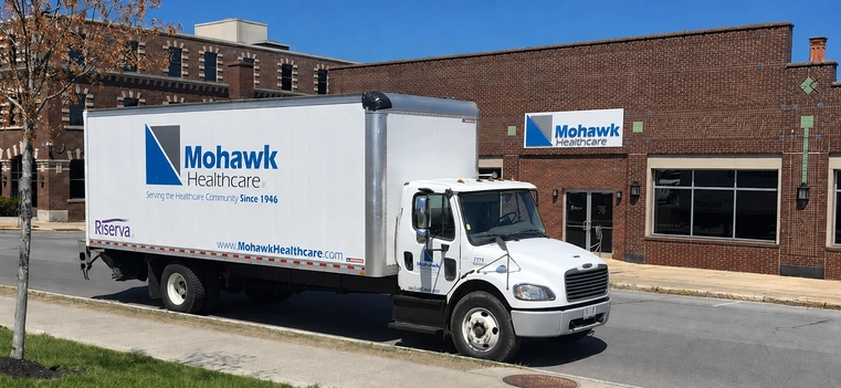 Mohawk Healthcare delivery truck outside the office